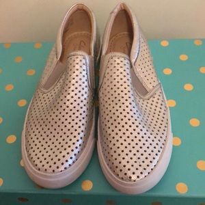 Metallic silver Clark’s topsider sneakers